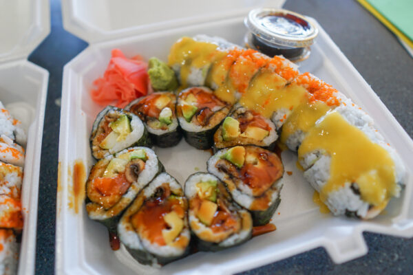 Strip District Roll and Mango and Salmon Roll